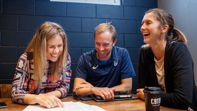 Marathon star Jess Trengove, coach Adam Didyk and sports dietitian Olivia Warnes sit down to plot a training for two, now Jess is pregnant for the first time — over coffee at Coffee By the Bean in Lockleys. Picture Matt Turner.