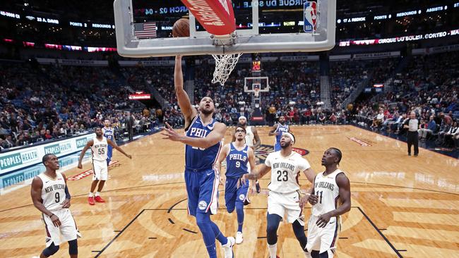 Philadelphia 76ers guard Ben Simmons goes to the basket in the first half of a game against the New Orleans Pelicans. (AP Photo/Gerald Herbert)