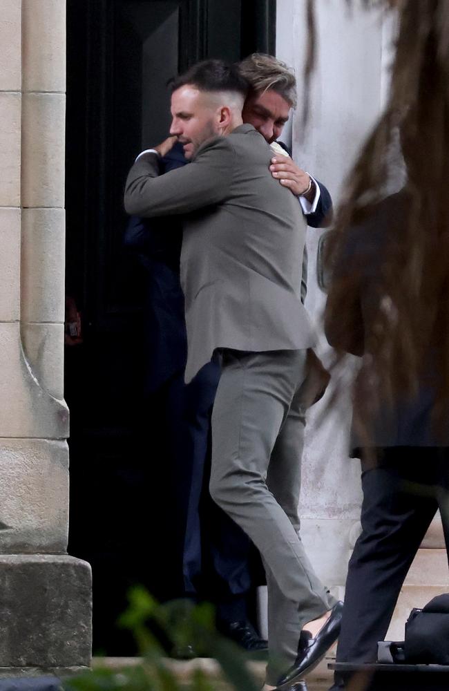 Beau Ryan pictured hugging John Ibrahim at the wedding of Kyle Sandilands and Tegan Kynaston at Swifts in Darling Point. Picture by Damian Shaw