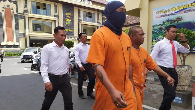 William Cabantog taken for police questioning. Picture: Wayan Nambi Putra