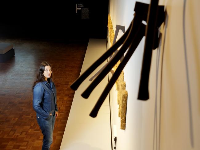 Artist Rachel Labastie, from France, with part of her installation for <i>A Journey to Freedom</i> at TMAG. Picture: RICHARD JUPE