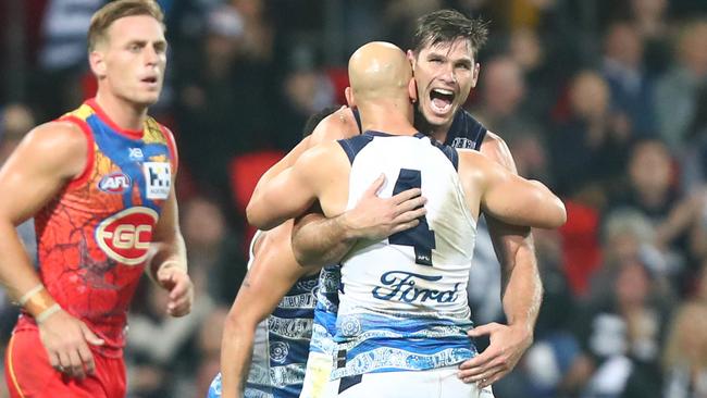 Tom Hawkins and Gary Ablett celebrate a goal during Geelong’s win against Gold Coast. Picture: Chris Hyde/Getty Images.