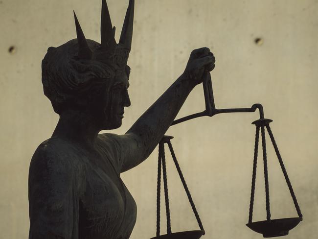 BRISBANE , AUSTRALIA - NewsWire Photos - BRISBANE , JUNE 24 2024: Generic photo of the scales of justice stature outside Brisbane Supreme Court in the Brisbane CBD. Picture: NewsWire / Glenn Campbell