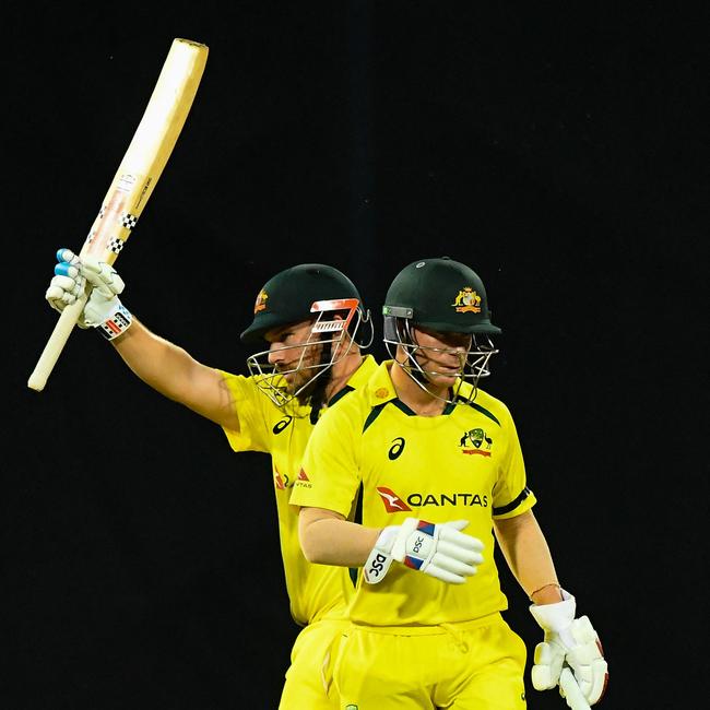 Aaron Finch and David Warner guided Australia to an easy win over Sri Lanka. Picture: Ishara S. Kodikara/AFP