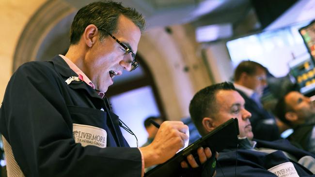 Traders work on the floor of the New York Stock Exchange. Picture: Getty Images