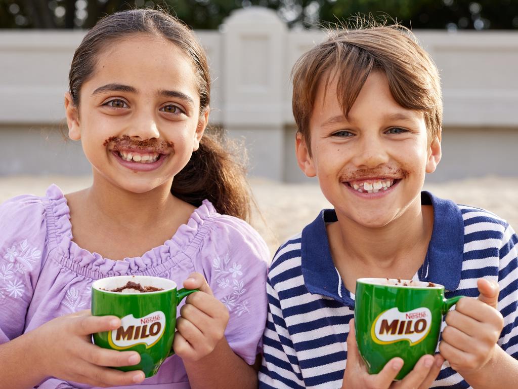 Lucy and Archie, both 7, sporting classic MILO milk moustaches. Picture: Australia Post/David Swift.