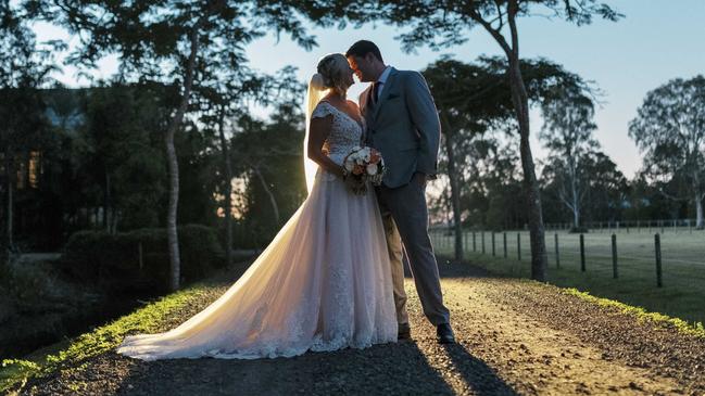 Happy couple: Matthew Brunes and Bridget Williams share and intimate moment. Picture: iSpy Wedding Photography (Dylan Evans)