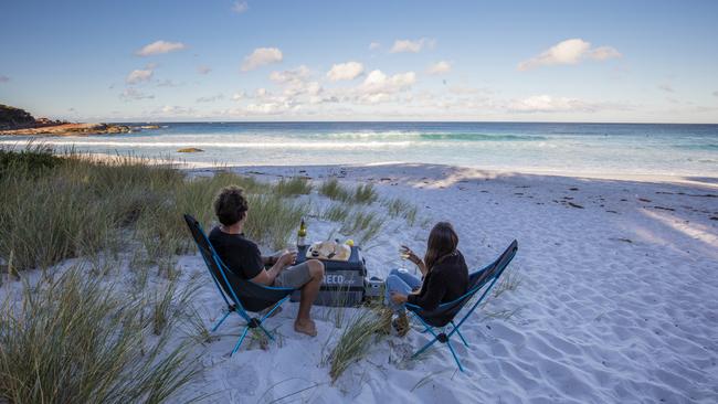 The Bay of Fires, located within larapuna, is another perfect spot to drink in the beauty of the East Coast and its award-winning wines. Picture: Sean Scott/Tourism Tasmania