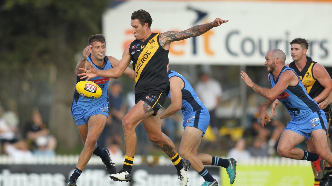 SANFL: Glenelg v Sturt at Glenelg Oval. Glenelg's Jesse White kicks toward goal.19 April 2019. Picture Dean Martin