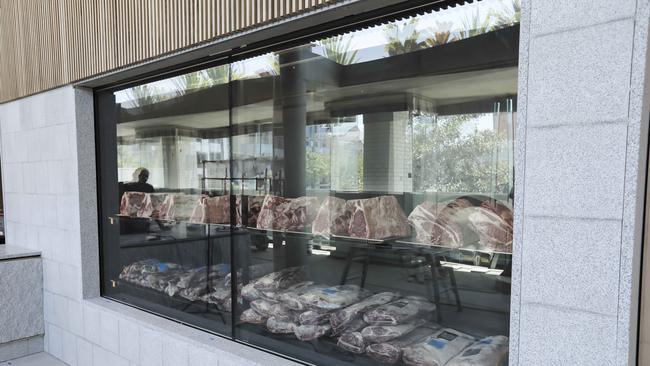 The steak fridge at the new SK Steak & Oyster in The Calile Hotel precinct. Picture: Mark Cranitch