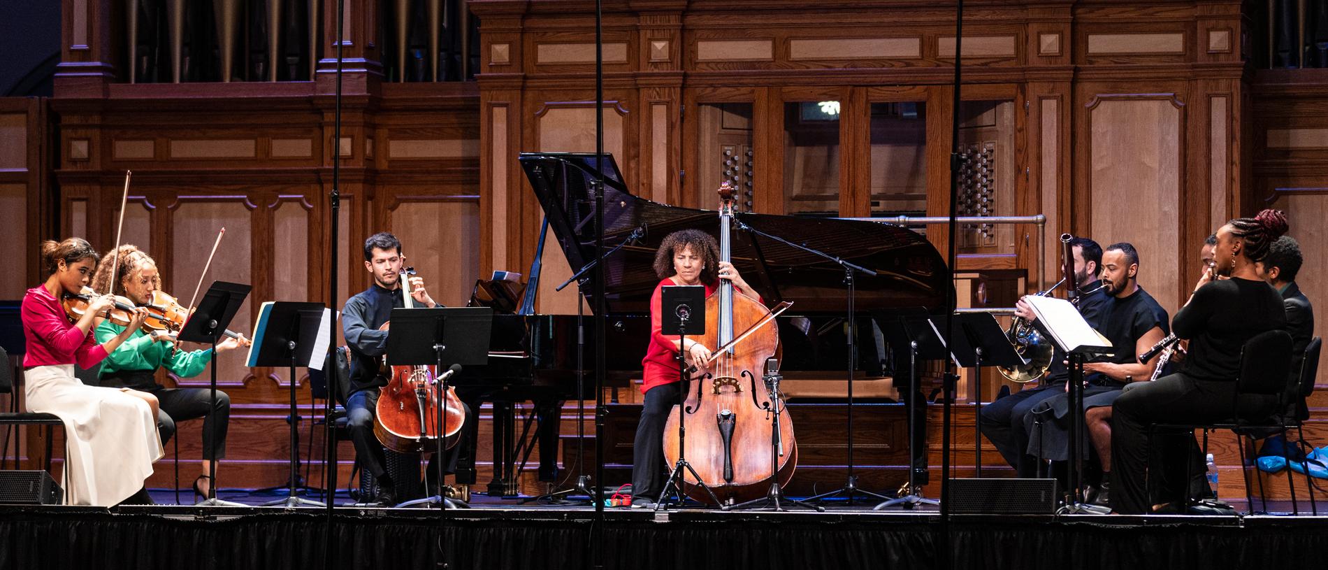 Chineke! Chamber Ensemble performs at Adelaide Town Hall with founder Chi-chi Nwanoku, centre, on double bass. Picture: Andrew Beveridge, supplied