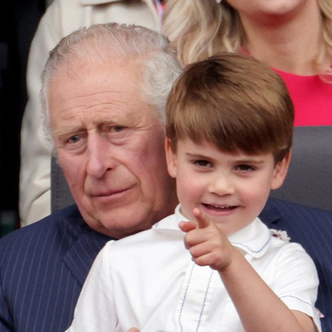 Prince Louis gets some time in with granddad Prince Charles. Picture: Chris Jackson/WPA/Getty Images