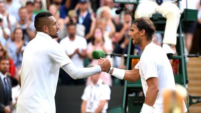 Kyrgios and Nadal shake hands after their 2019 match - where the Aussie said he was at his ‘lowest point’.