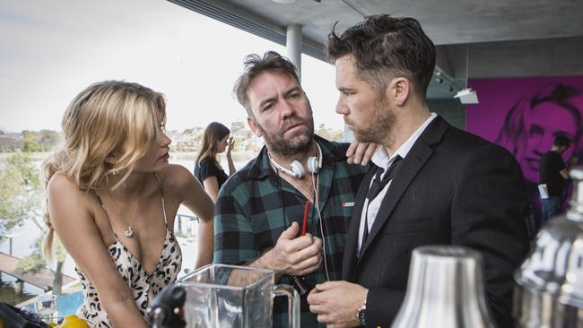 Feature debut ... Abbey Lee and Patrick Brammall on the set of Ruben Guthrie with director Brendan Cowell.