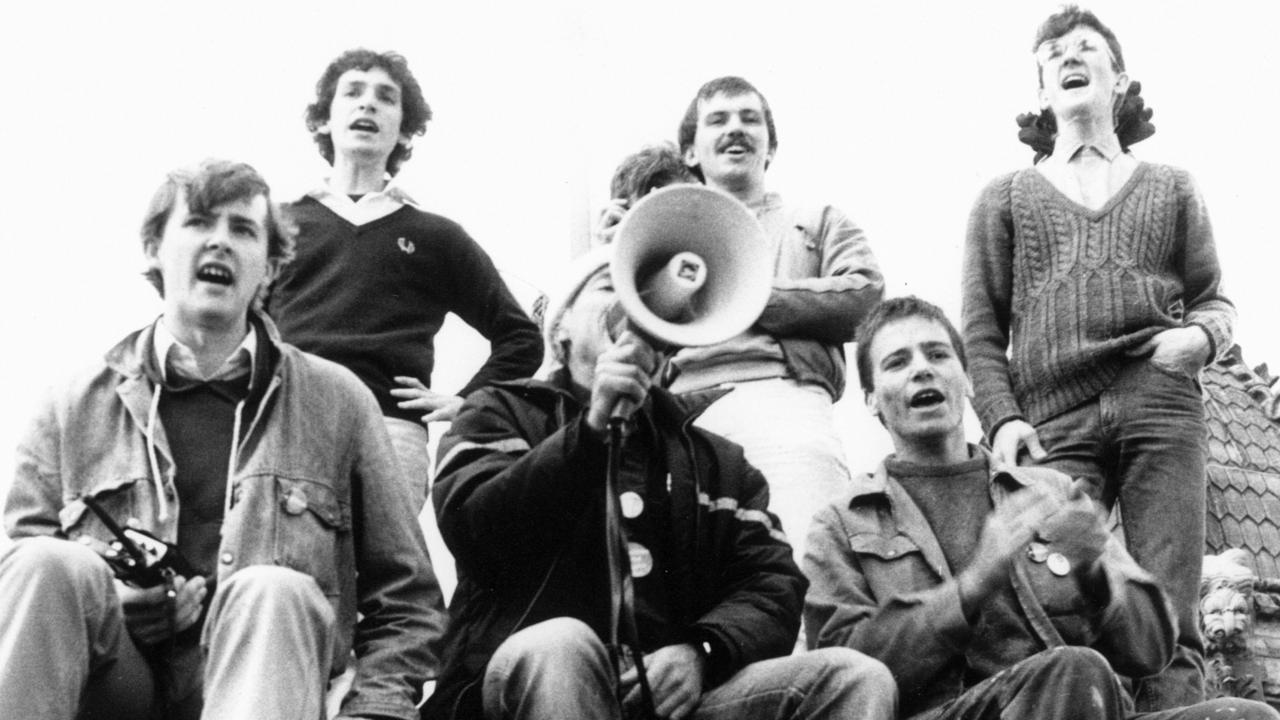 A young Anthony Albanese (L), leads students in a protest atop the University of Sydney clock tower in an undated copy photo.