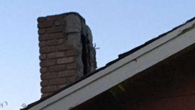 Burglar trapped in chimney Picture: Twitter