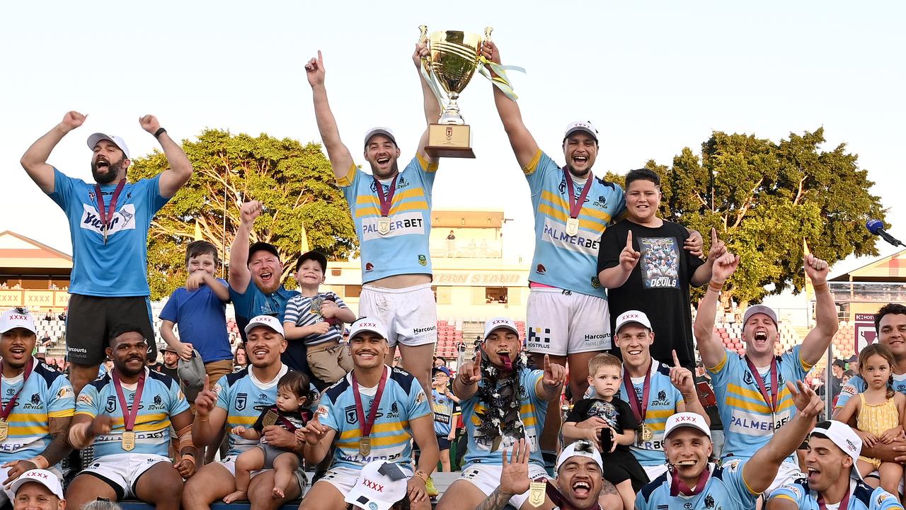 Norths Devils celebrate winning the 2022 QCup grand final. Picture: Bradley Kanaris/Getty