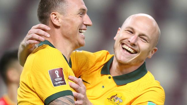 DOHA, QATAR - SEPTEMBER 02: Mitchell Duke of Australia  celebrates after scoring their team's third goal during the 2022 FIFA World Cup Qualifier match between Australia and China PR at Khalifa International Stadium on September 02, 2021 in Doha, Qatar. (Photo by Mohamed Farag/Getty Images)