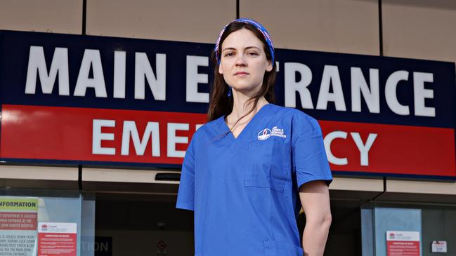 Nurse Rebekah Fox, pictured out the front of John Hunter Hospital, says NSW nurses are being taken advantage of by the system. Photographer: Adam yip