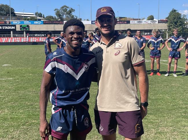 Player of the match Emmanuel Kasunga with former Bronco Matt Gillett following the Langer Reserves grand final at Totally Workwear Stadium in Brisbane. Picture: Andrew Dawson