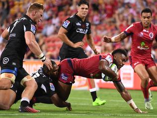 Reds player Sam Kerevi crosses over to score a try during the 1st round Super Rugby match between the Queensland Reds and the Sharks from South Africa, at Suncorp Stadium in Brisbane, Friday, Feb. 24, 2017. (AAP Image/Dave Hunt) NO ARCHIVING, EDITORIAL USE ONLY