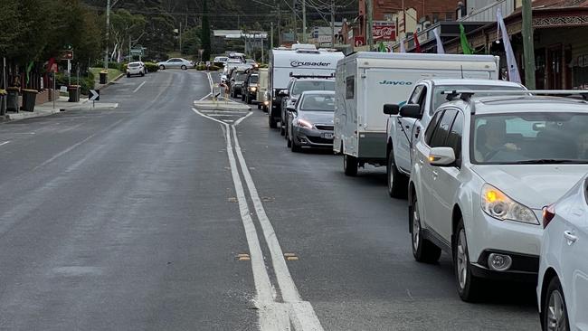 Victorians clog the streets of the NSW far south coast town of Pambula as holidaymakers flood back to their home state ahead of border closures.