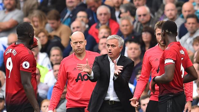 Jose Mourinho talks to his players during the match. Picture: AFP Photo