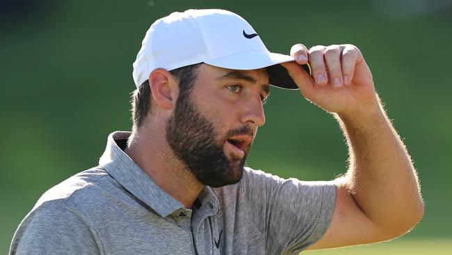 Scottie Scheffler of the United States looks on from the 18th greenduring the third round of the 2024 PGA Championship at Valhalla Golf Club in Louisville, Kentucky.