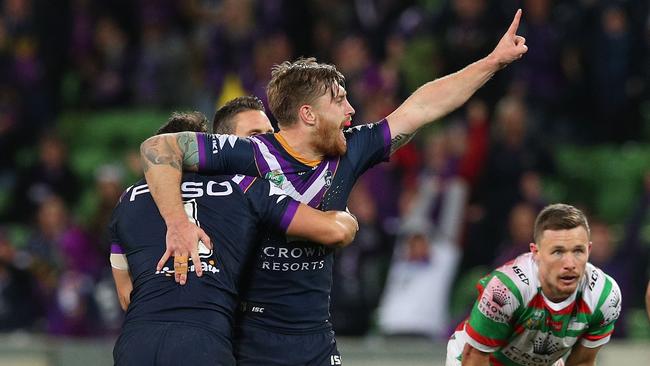 MELBOURNE, AUSTRALIA - SEPTEMBER 07:  Cameron Munster of the Storm celebrates kicking a drop goal during the NRL Qualifying Final match between the Melbourne Storm and the South Sydney Rabbitohs at AAMI Park on September 7, 2018 in Melbourne, Australia.  (Photo by Graham Denholm/Getty Images)