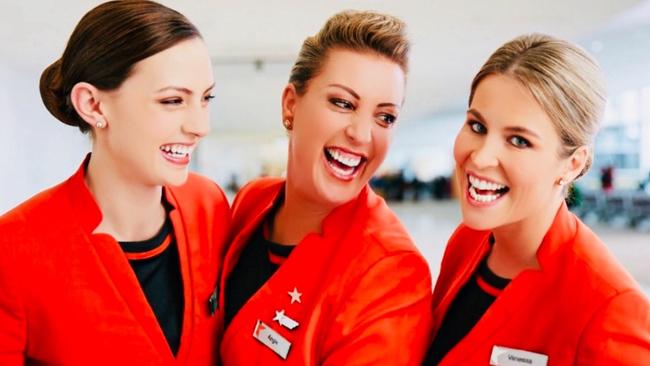 Jetstar cabin crew manager Angie Holzinger (centre) will mark the airline's 20th birthday on a flight from Newcastle to Melbourne on Saturday. Picture: Supplied