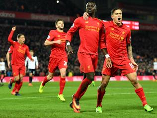 LIVERPOOL, ENGLAND - FEBRUARY 11: Sadio Mane (2nd R) of Liverpool celebrates scoring his side's second goal with his team mate Philippe Coutinho (1st R) during the Premier League match between Liverpool and Tottenham Hotspur at Anfield on February 11, 2017 in Liverpool, England. (Photo by Mike Hewitt/Getty Images for Tottenham Hotspur FC)