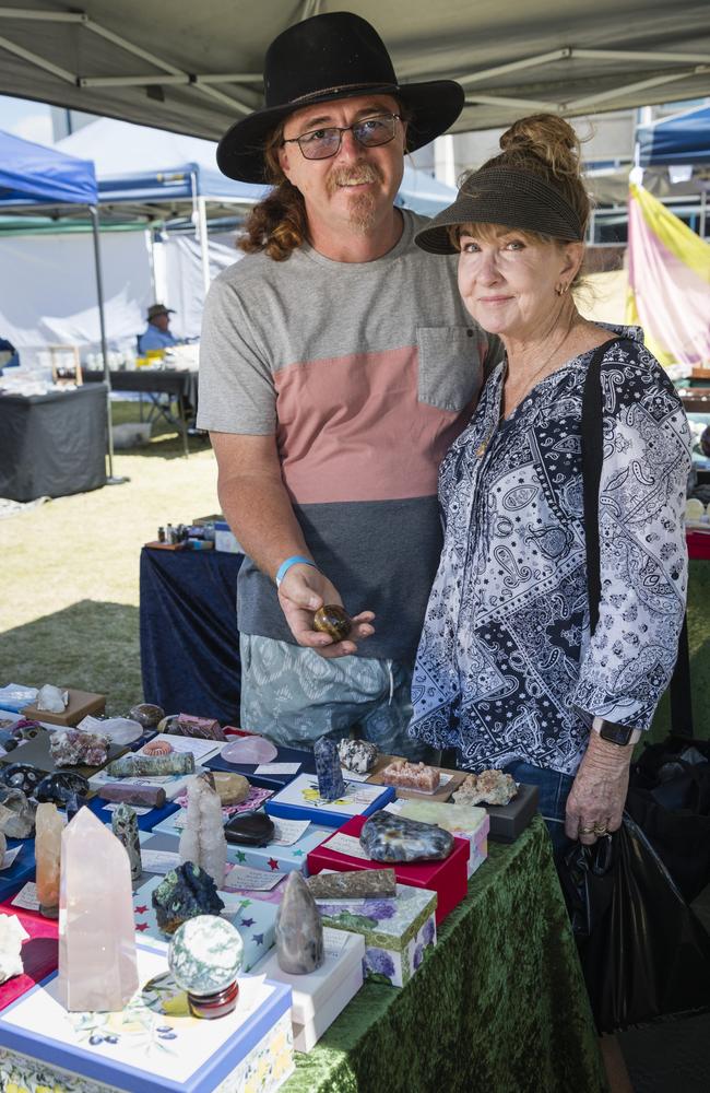 Chris and Sandie Perry check out the Earth Delights stall at Gemfest hosted by Toowoomba Lapidary Club at Centenary Heights State High School, Saturday, October 21, 2023. Picture: Kevin Farmer