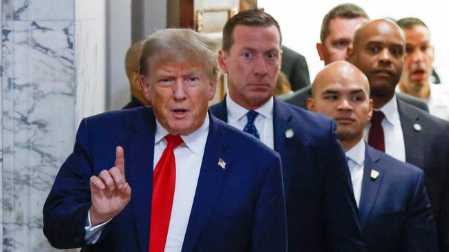 Donald Trump makes a point leaving court in New York on Tuesday. Picture: AFP