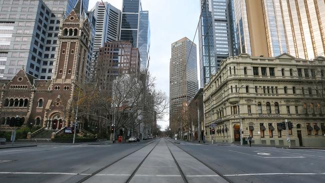 The normally bustling Melbourne CBD is deserted as the city locks down to stem the spread of coronavirus. Picture: Ian Currie