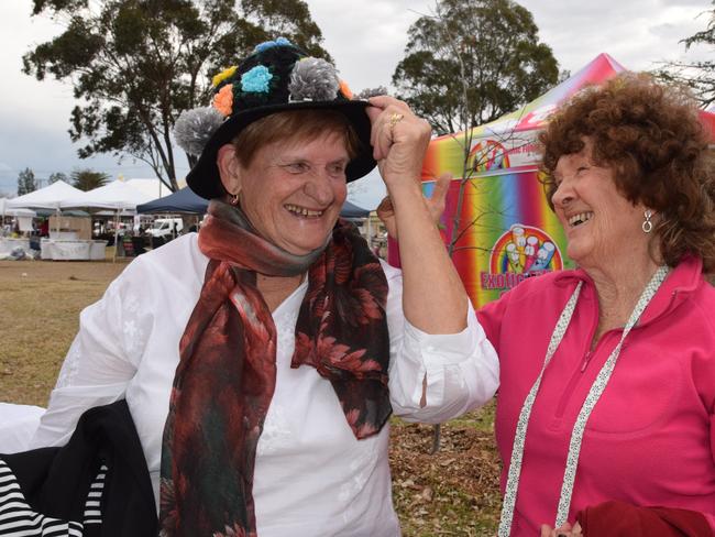 Rose Clarke (left) and Joy Jones at the Potter's Craft Market for Jumpers and Jazz in July.