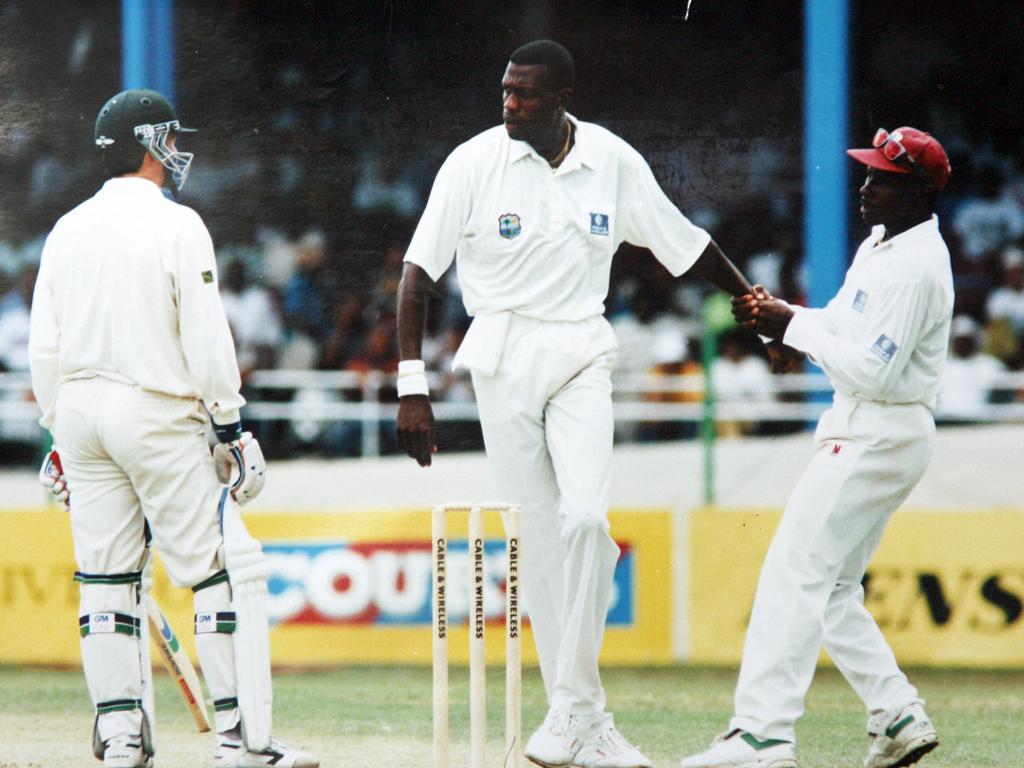 Richie Richardson tries to pull Curtly Ambrose away from Steve Waugh during an argument in 1995. Picture: Ray Titus