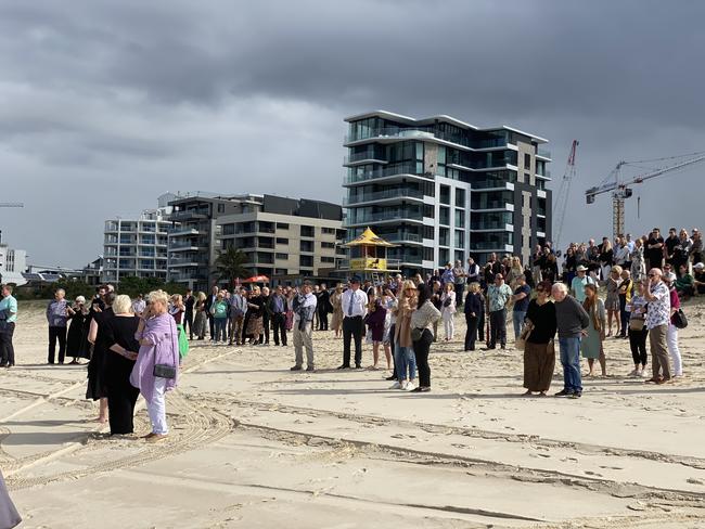 Crowds of family, friends and colleagues gathered at Tallebudgera Beach to send off Peter Devenport at his beachside memorial service. Picture: Amaani Siddeek