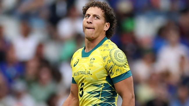 PARIS, FRANCE - JULY 24: Mark Nawaqanitawase #5 of Team Australia looks on during the Men's Rugby Sevens Pool B Group match between Australia and Kenya on Day -2 of the Olympic Games Paris 2024 at Stade de France on July 24, 2024 in Paris, France. (Photo by Cameron Spencer/Getty Images)