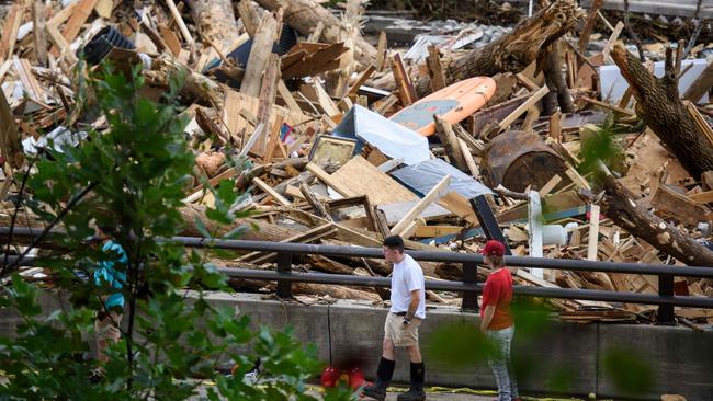 The Rocky Broad River flows into Lake Lure and overflows the town with debris from Chimney Rock, North Carolina. Picture: AFP