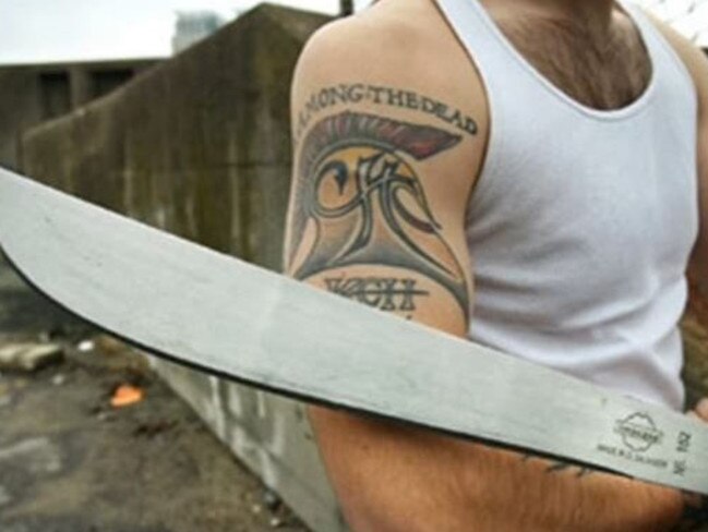 MS13 gang members have an arsenal of firearms but some prefer machetes to impose discipline and torture opponents. Picture: Supplied.