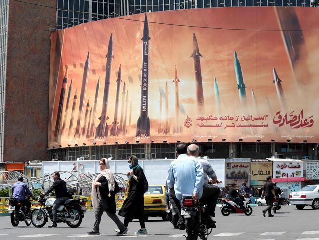 A billboard depicting Iranian missiles in Tehran on April 20. Picture: ATTA KENARE / AFP