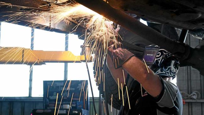 Seamus Taylor working on a car at Taylored Automotive. Picture: Contributed