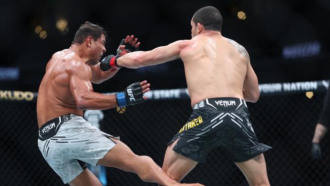 Whittaker lands a left on the Brazilian. (Photo by Sean M. Haffey/Getty Images)