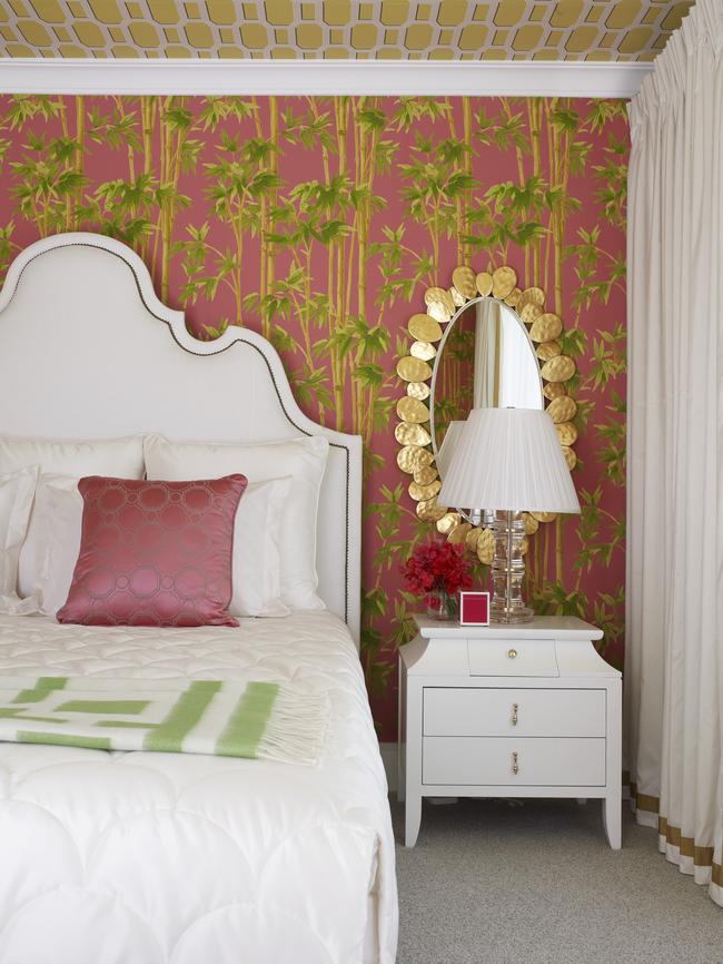 Colour is the uniting factor in this bedroom with white furniture for balance.