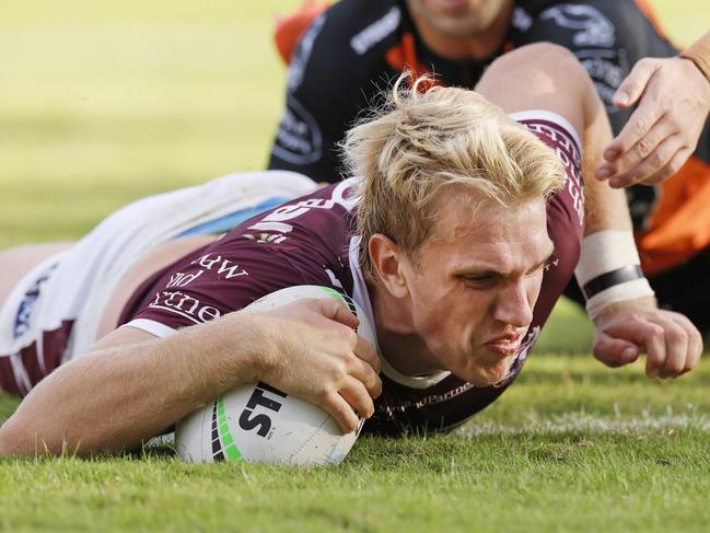 SYDNEY, AUSTRALIA - MAY 07: Ben Trbojevic of the Sea Eagles scores his first try in the NRL during the round nine NRL match between the Manly Sea Eagles and the Wests Tigers at 4 Pines Park, on May 07, 2022, in Sydney, Australia. (Photo by Mark Evans/Getty Images)