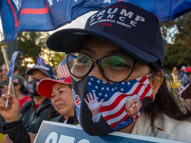 Supporters of US President Donald Trump rally in California. Picture: David Mcnew