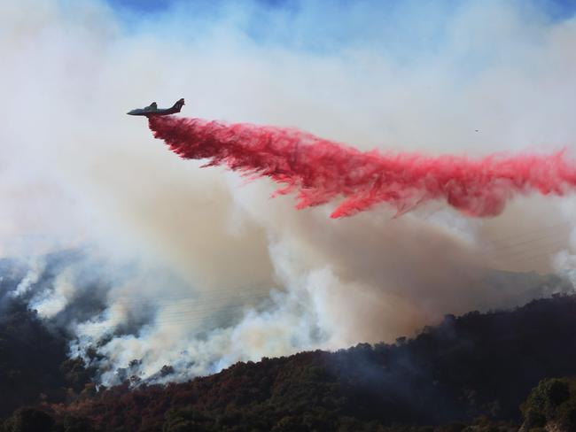 Retardant is dropped as the Palisades Fire grows near Encino Hills, California. Picture: David Swanson/AFP