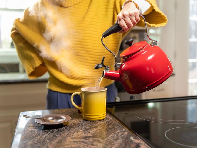 Woman preparing a tea on