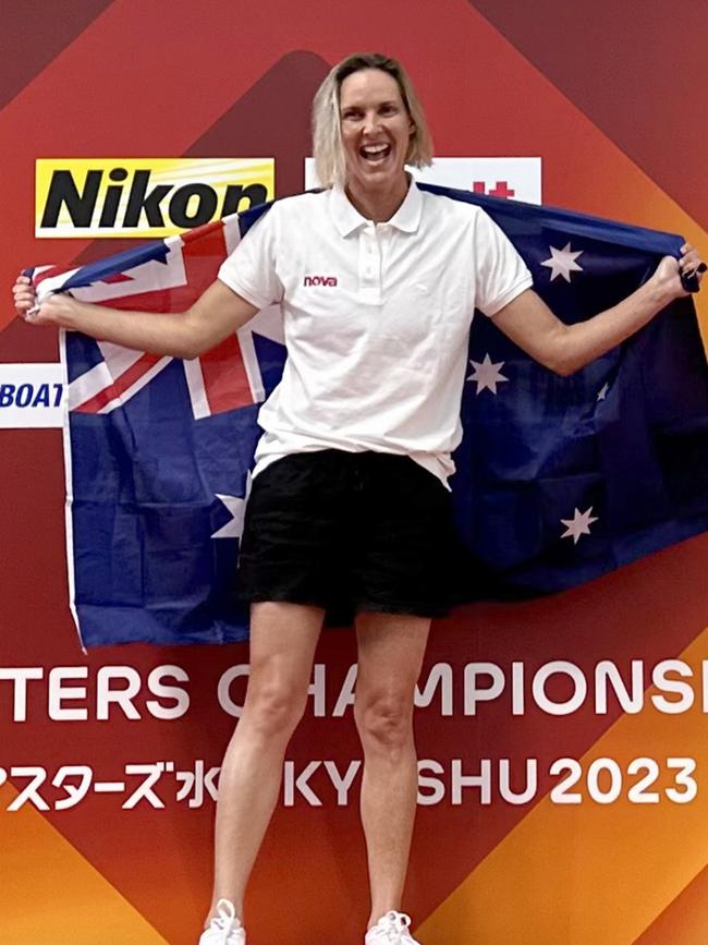 Susie O'Neill on top of the podium at the World Masters Swimming Championships.