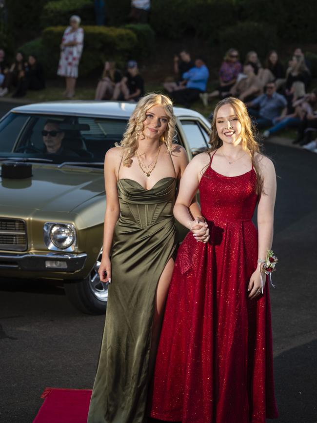 Phoenix Cooney (left) and Emily Berghofer at Harristown State High School formal at Highfields Cultural Centre, Friday, November 18, 2022. Picture: Kevin Farmer